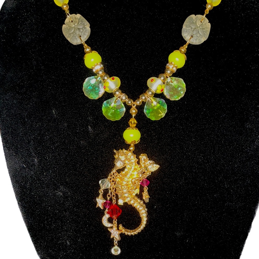 #50. VTG/RETIRED KIRKS FOLLY BROOCH/PENDANT ON GLASS BEADED GOLDTONE SNAKE CHAIN